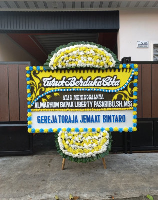 Papan Bunga Duka di Pipitan